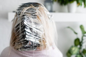 Woman getting highlights