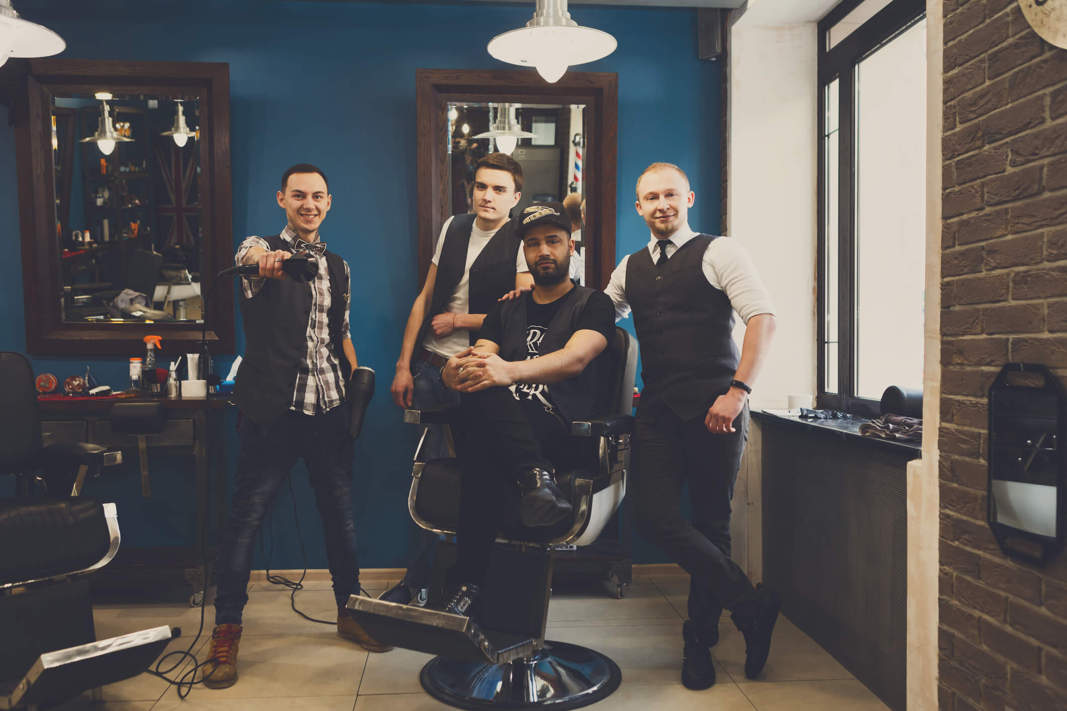 Image of four barbers