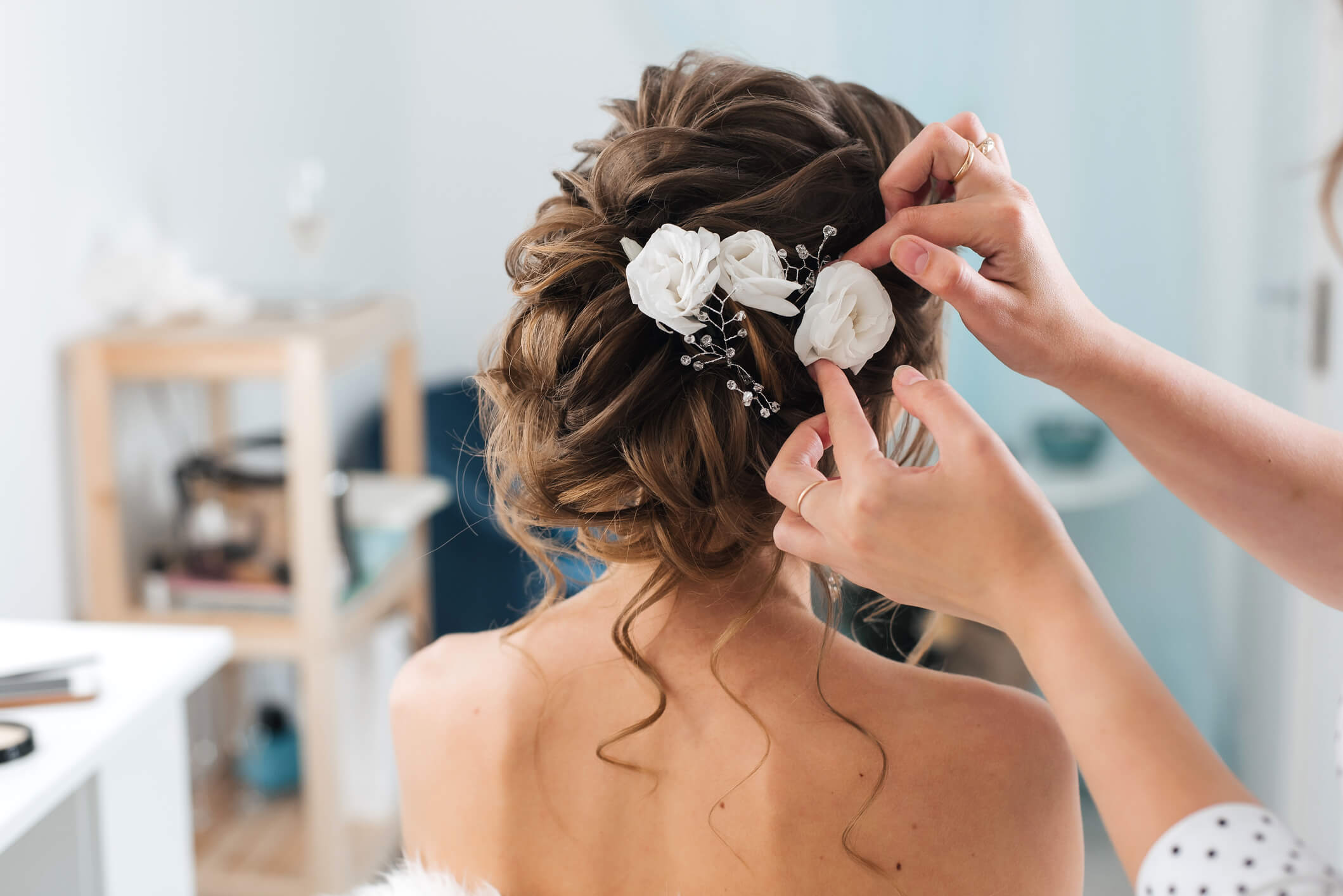 Image of a styled hair with white flowers