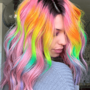 Image of a woman with rainbow-colored hair
