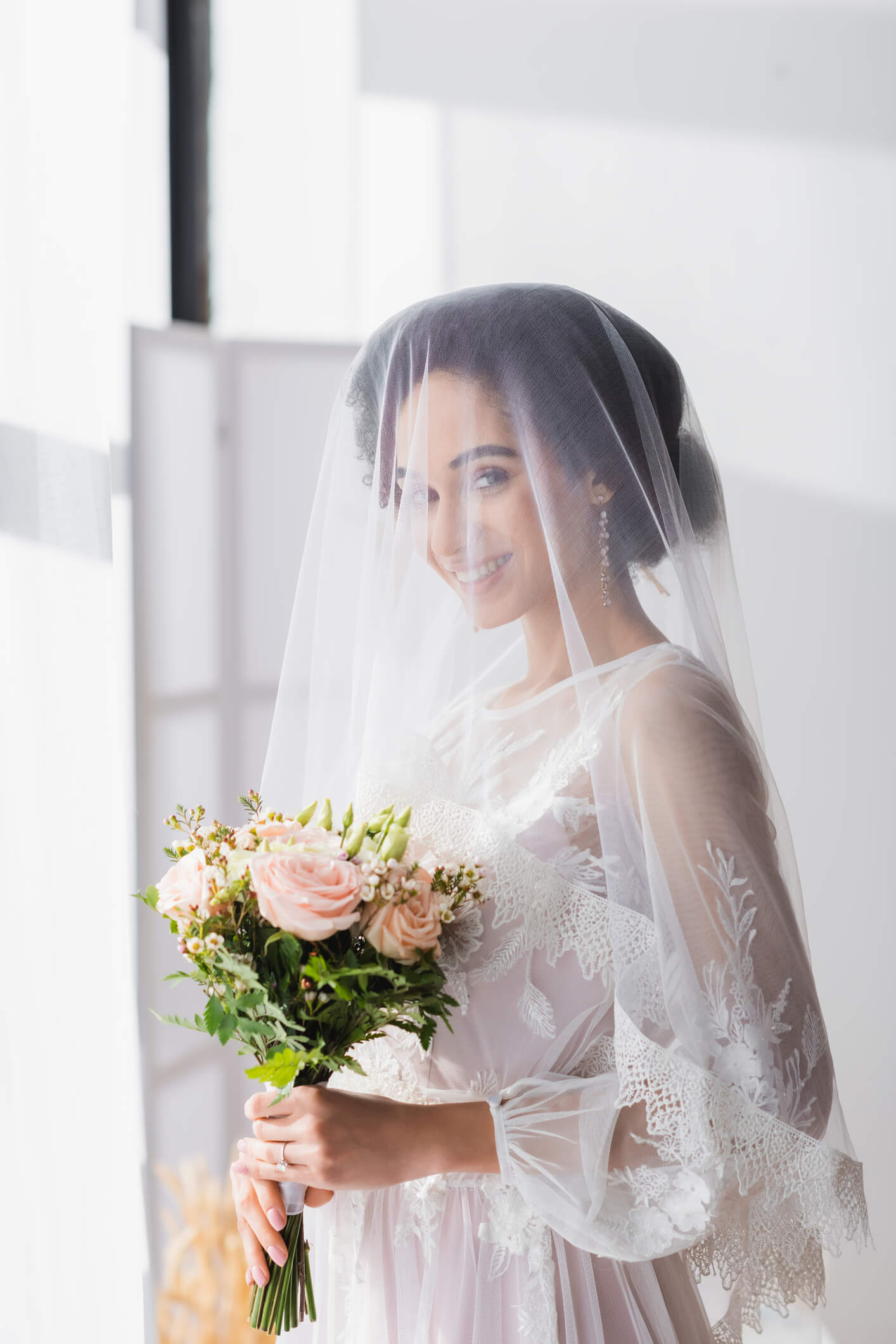 happy-african-american-bride-veil-happy-african-american-bride-veil-looking-camera-holding-wedding-bouquet