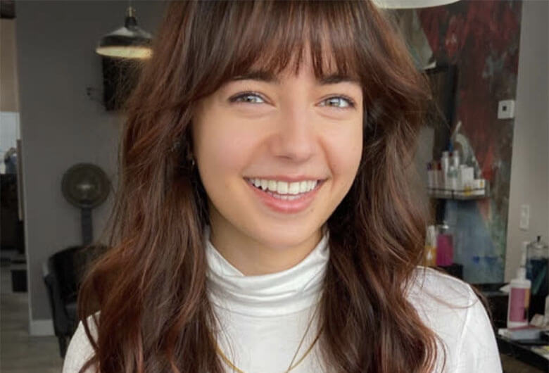 happy woman with bangs
