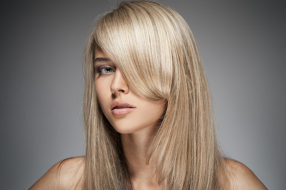 portrait wearing beige blonde hairstyle