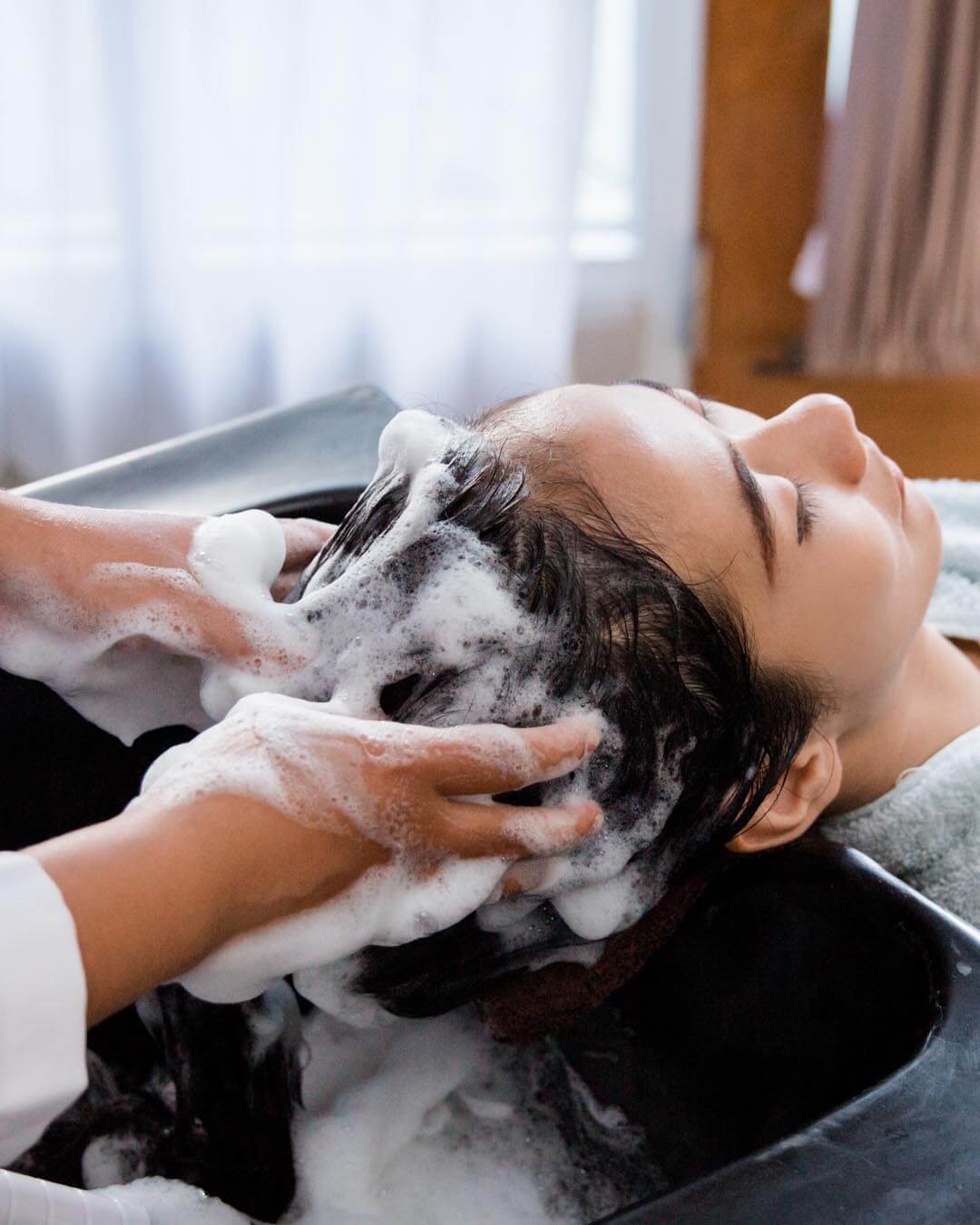 washing client hair in sink