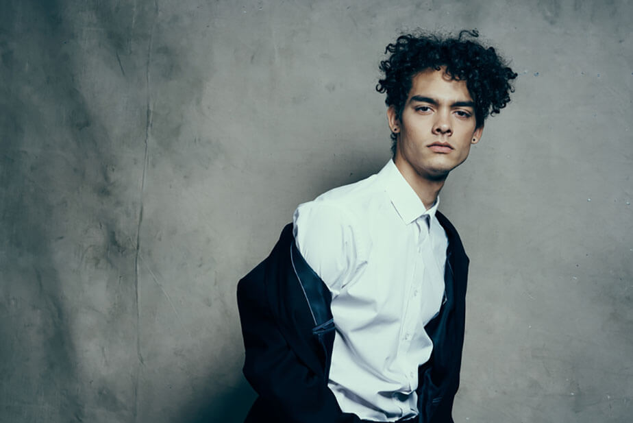 portrait man with short curly hair