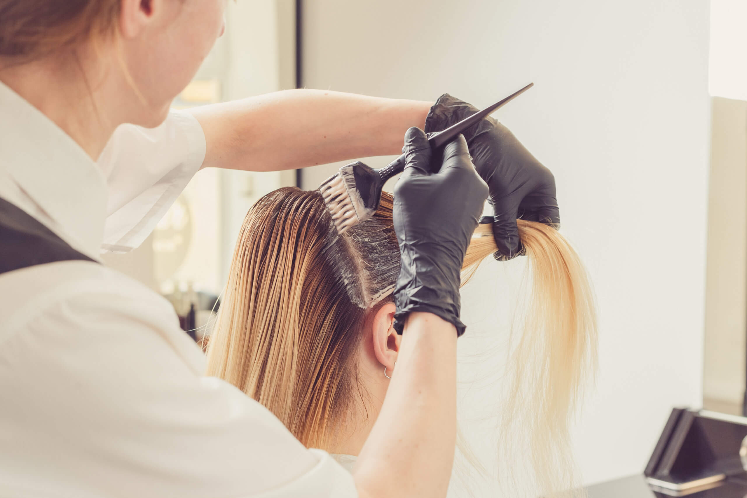 Applying Dye to Client Hair
